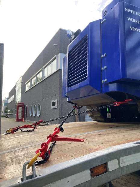 Hoe gebruik ik antislipmatten en spanbanden om mijn lading correct te zekeren?